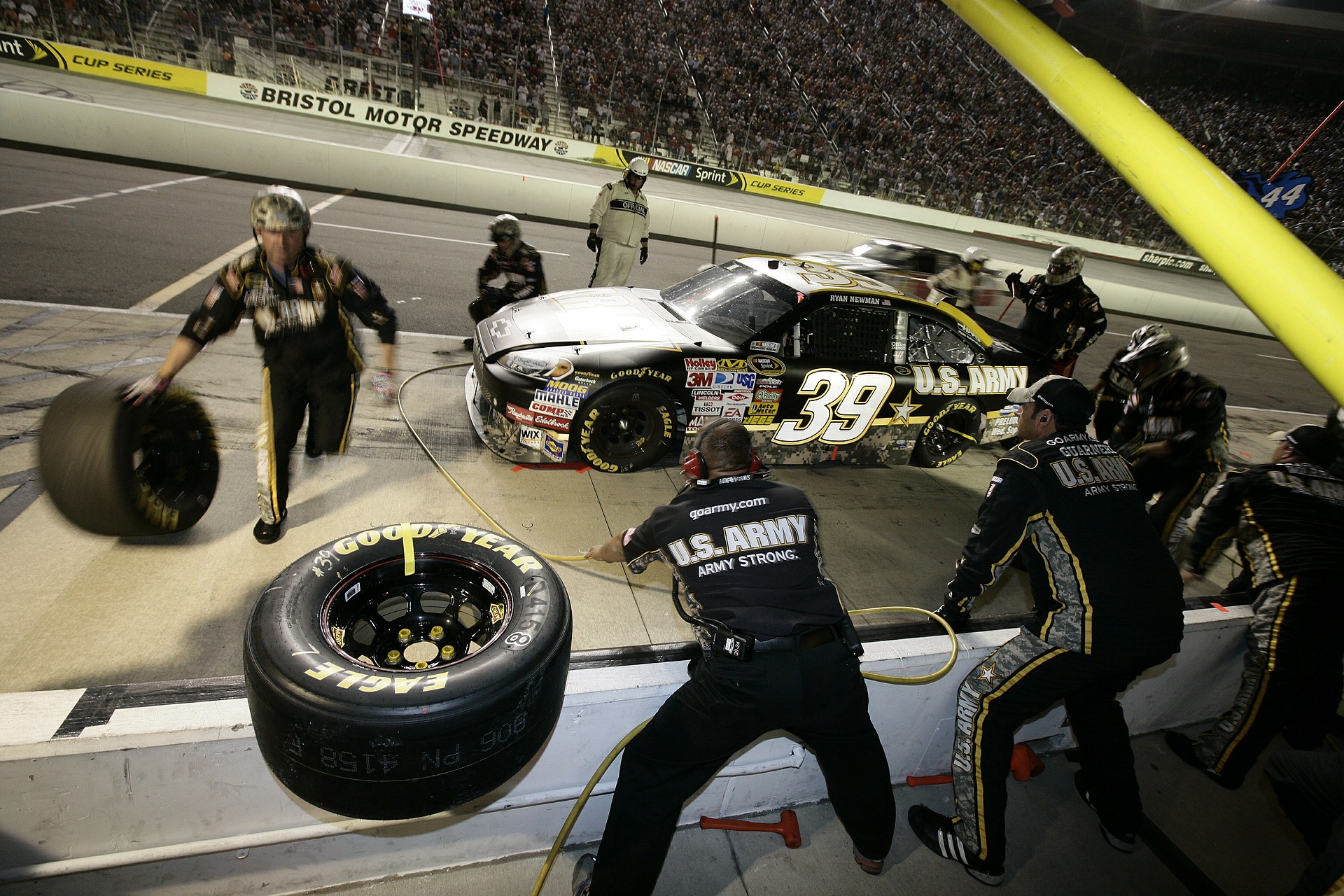 Drivers may double their duties by helping out as a pit crew member. 